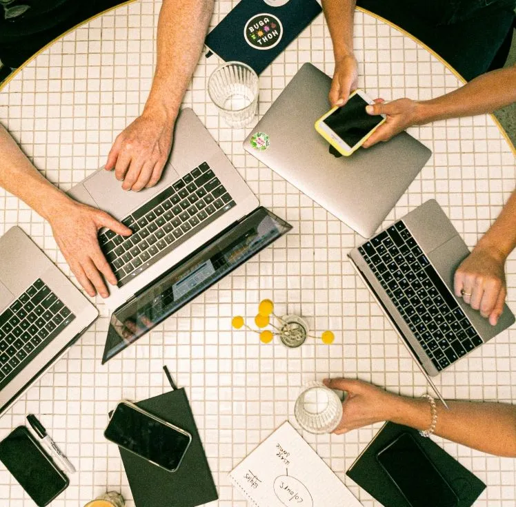Team with laptops